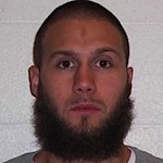 Michael D. McCright, a.k.a. Mikhial Jihad, a previously convicted felon from the north Seattle suburb of Lynnwood, pled guilty to lesser charges in a case involving his attempt to force a government vehicle carrying two Marines off the road and cause a collision on an interstate highway in Seattle.